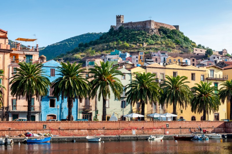 View of the river, the town of Bosa and the old fort on the island of Sardinia in Italy
